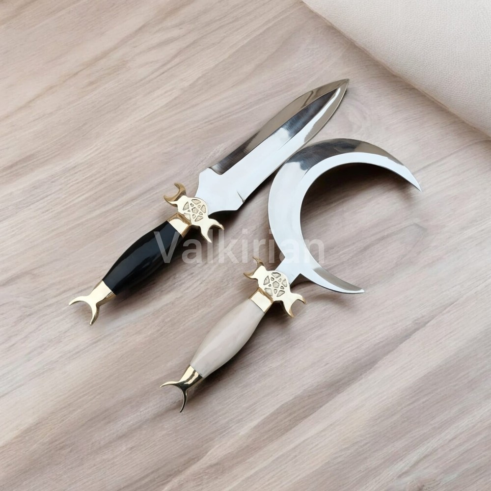 Handcrafted Crescent Moon Dagger with a curved blade and camel bone horn handle.