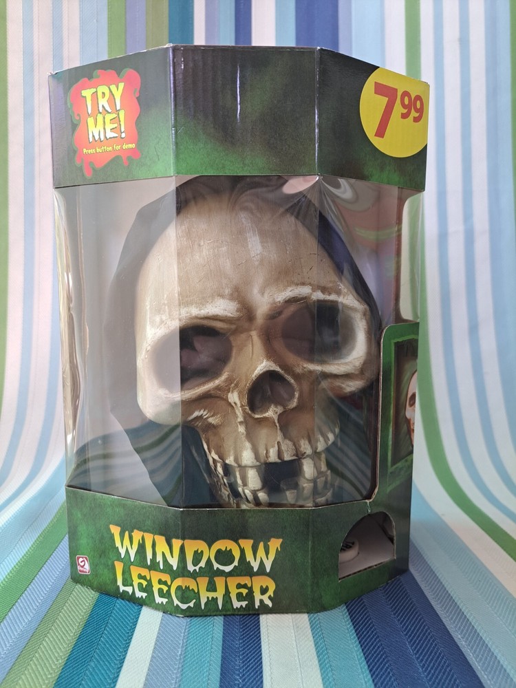 2008 GEMMY SKULL WINDOW LEECHER LIGHT UP NIB  "B"