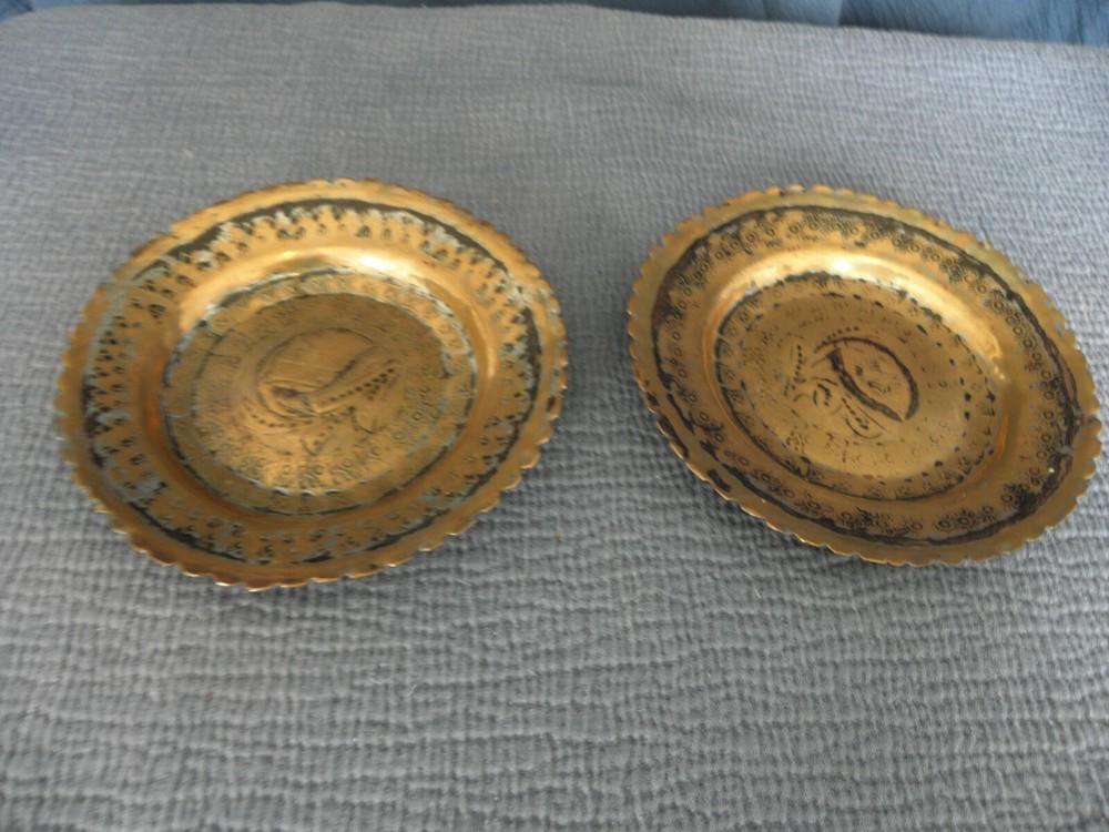 Pair of copper Middle Eastern dishes, both signed