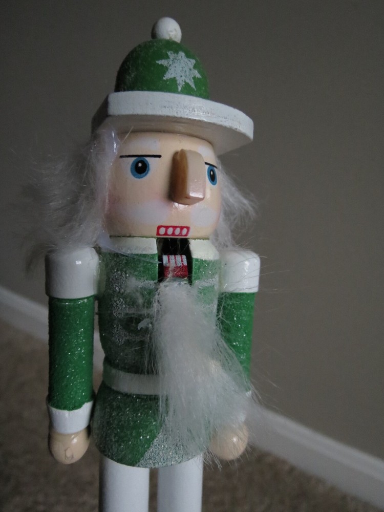 NWT GREEN & WHITE GLITTER WHITE HAIRED NUTCRACKER FIGURINE ON STAND
