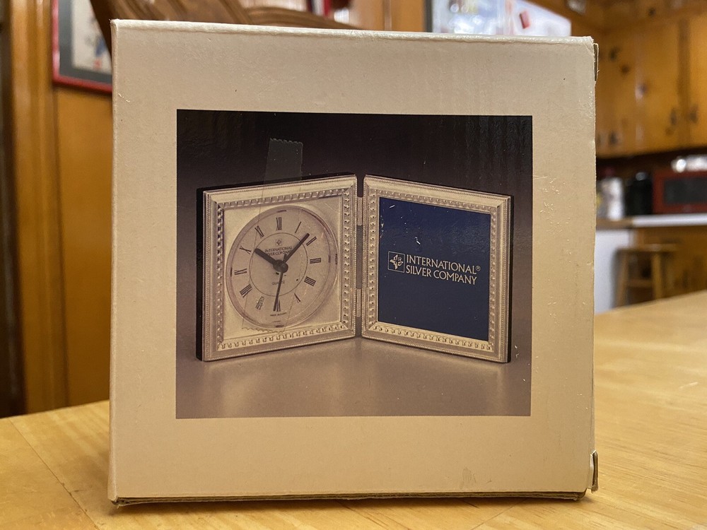 Silver plated double frame clock