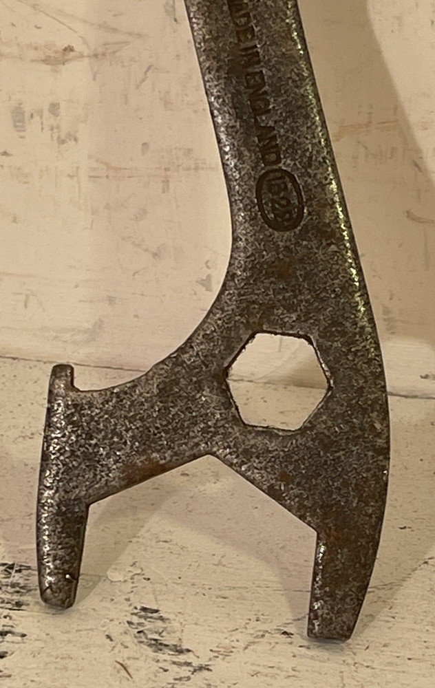 A vintage British mullti-use bicycle spanner