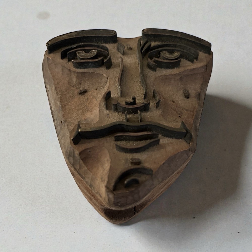 Small hand Carved wooden Face