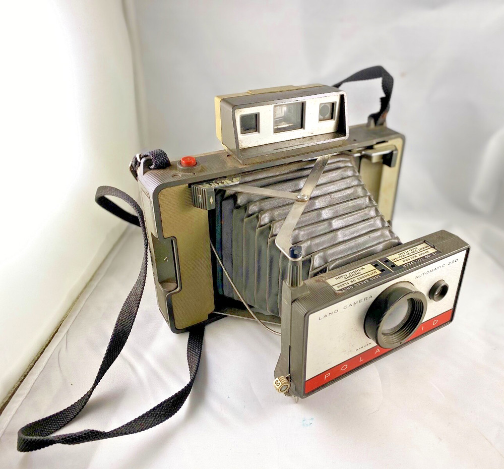 Vintage Polaroid Automatic 220 Land Camera with Built-In Case