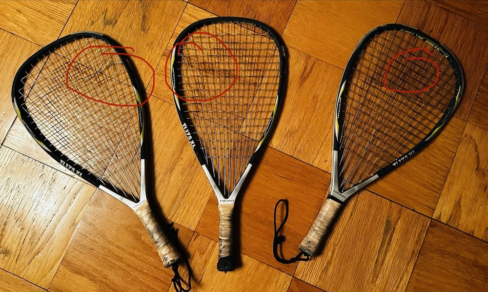 3 HEAD Titanium squash racquets –  need restringing.”