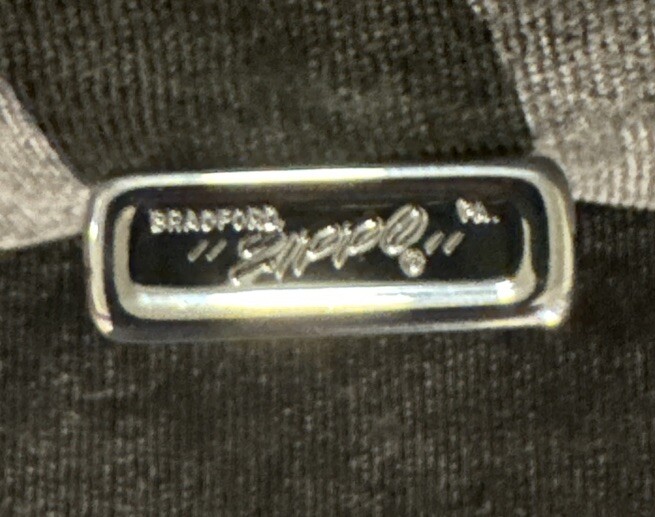 1970 Zippo Slim Lighter “HE” “HYRE”