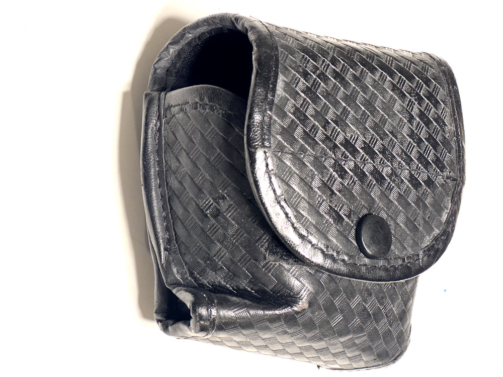 Basketweave Handcuff Holster Uncle Mike's One Piece Design