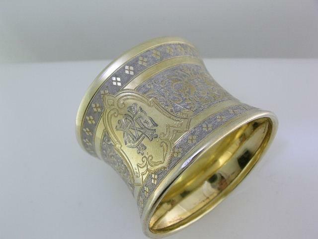 Decorative 800 Silver Napkin Ring w/ gold gilt finish & scroll patterns