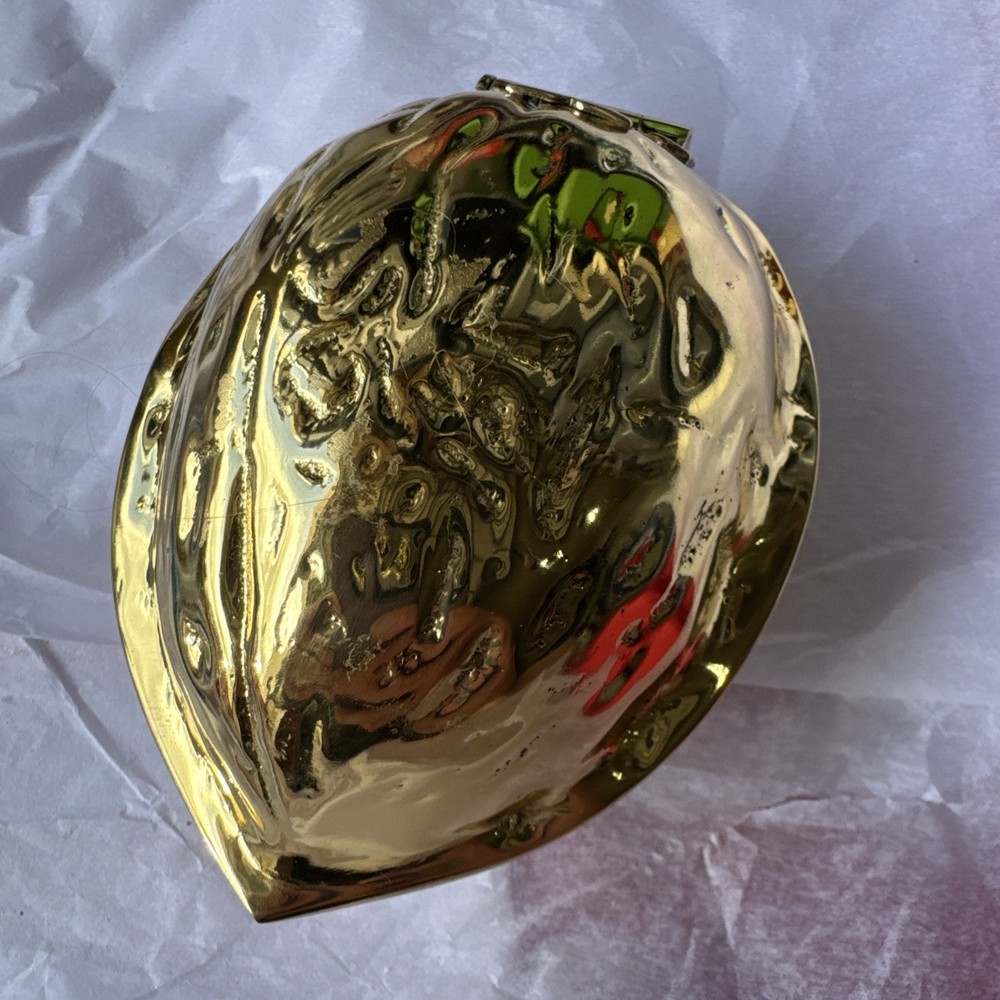 Tory Burch Brass "Robinson" Walnut Nutcracker