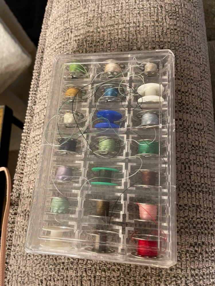 vintage 21 bobbins with some thread