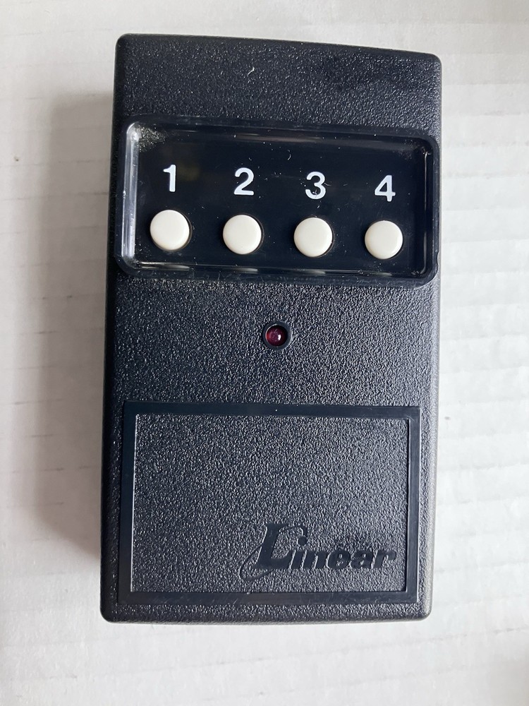 📳 OEM Linear DT-4 4 Button Remote Transmitter 310MHz 8 Dip Switch GuC Tested