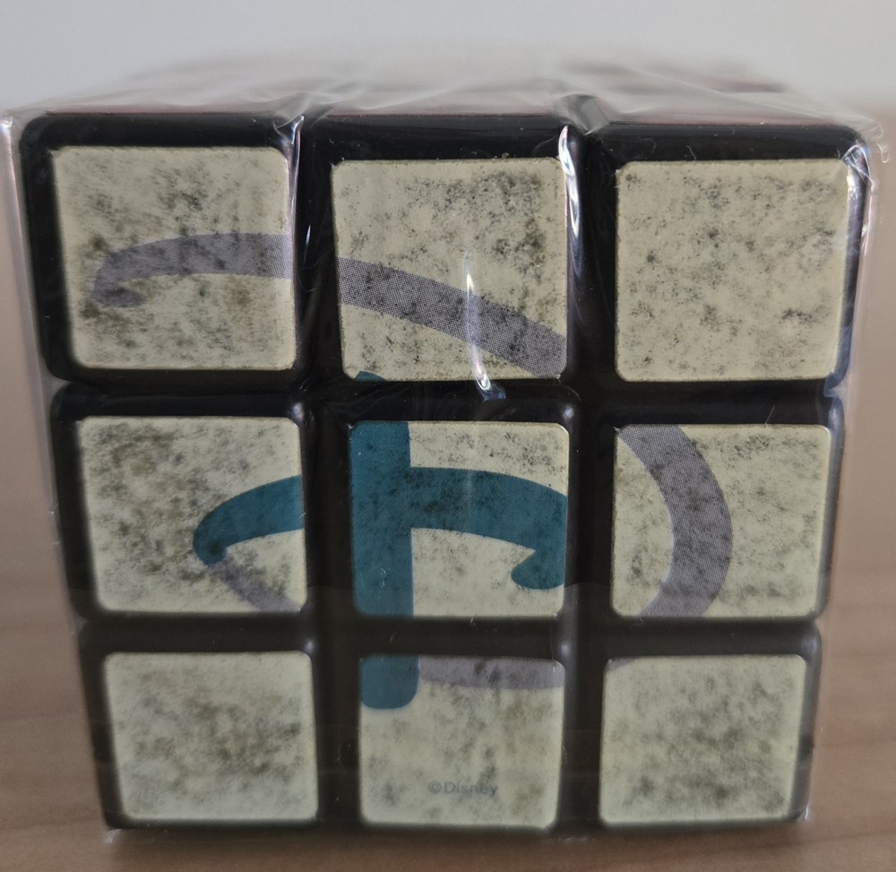 Disney RUBIKS Cube Puzzle Toy Multi-Colored Cast Exclusive. NEW SEALED
