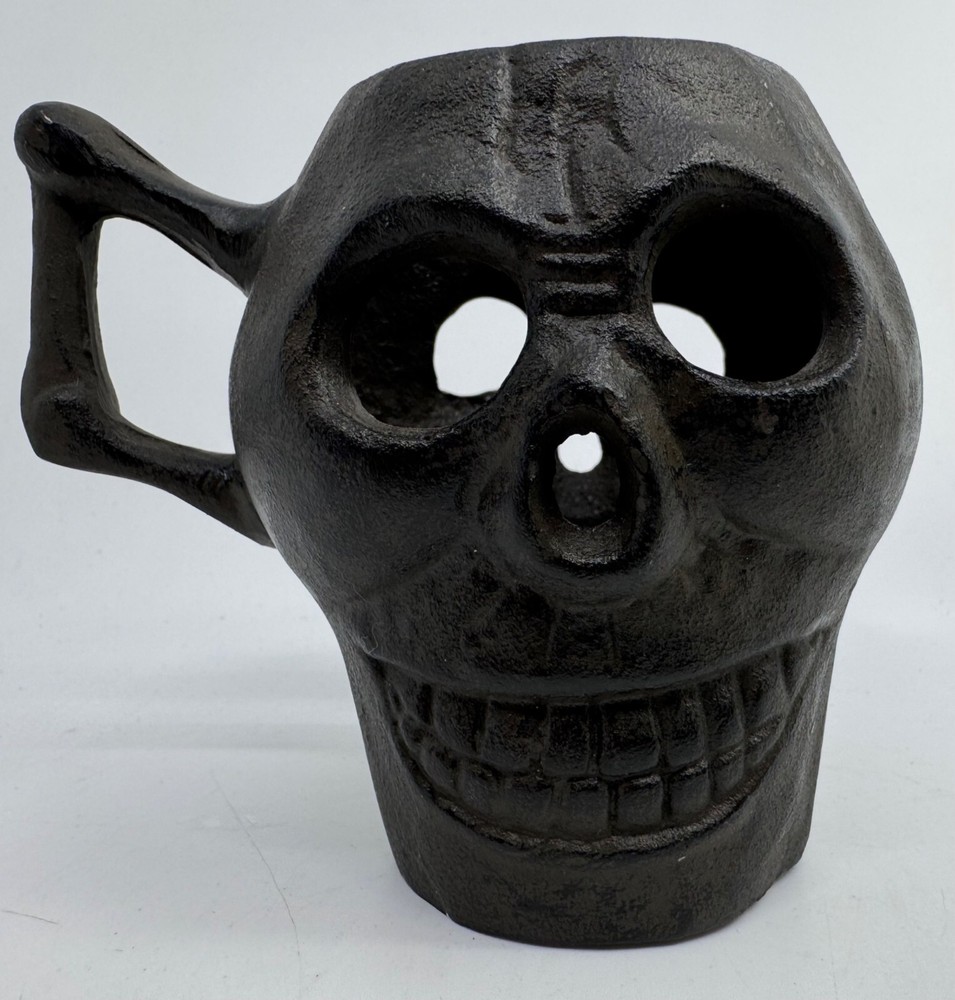 Cast Iron Skull-Shaped Bottomless Mug Thingy With Handle Both Ends And Eyes Open
