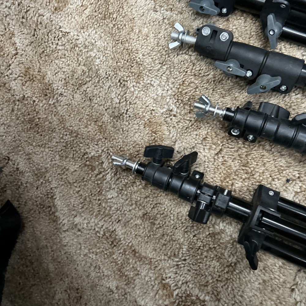 4 Neewer 200cm Light Stands - Slightly Used with two unknown brands