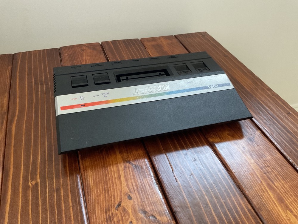 Atari 2600 bundle, games, cables, console, and controllers MAYBE WORKING - black