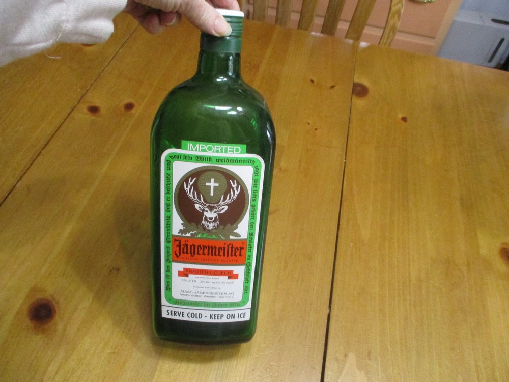 2-Empty Jagermesiter Bottles,1-1.75 Liter & 1-200 ml,Both Have Caps,Nice!
