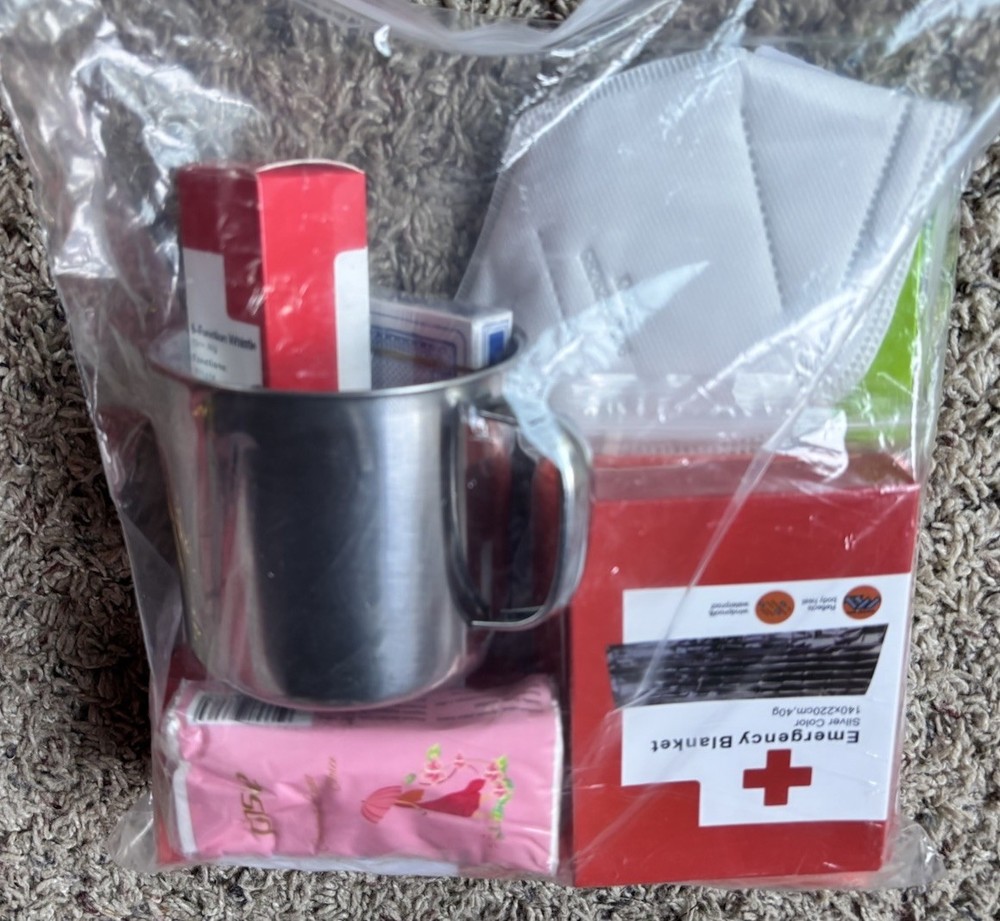ReadyWise Red White Emergency Survival Backpack (64 piece) open box
