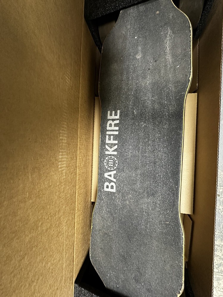 Backfire G2 Black Electric Skateboard With Extra Wheels, Charger & Remote