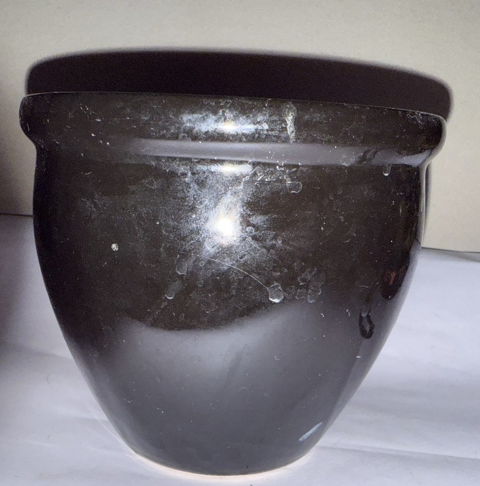 black flower pot pottery vintage