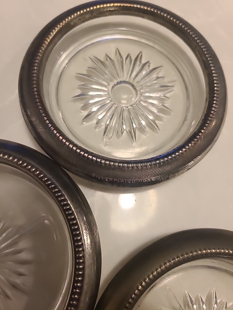 3 Leonard silver-plated rim glass coasters