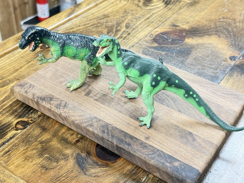 Carnegie Collection dinosaur models original and revised Allosaurus