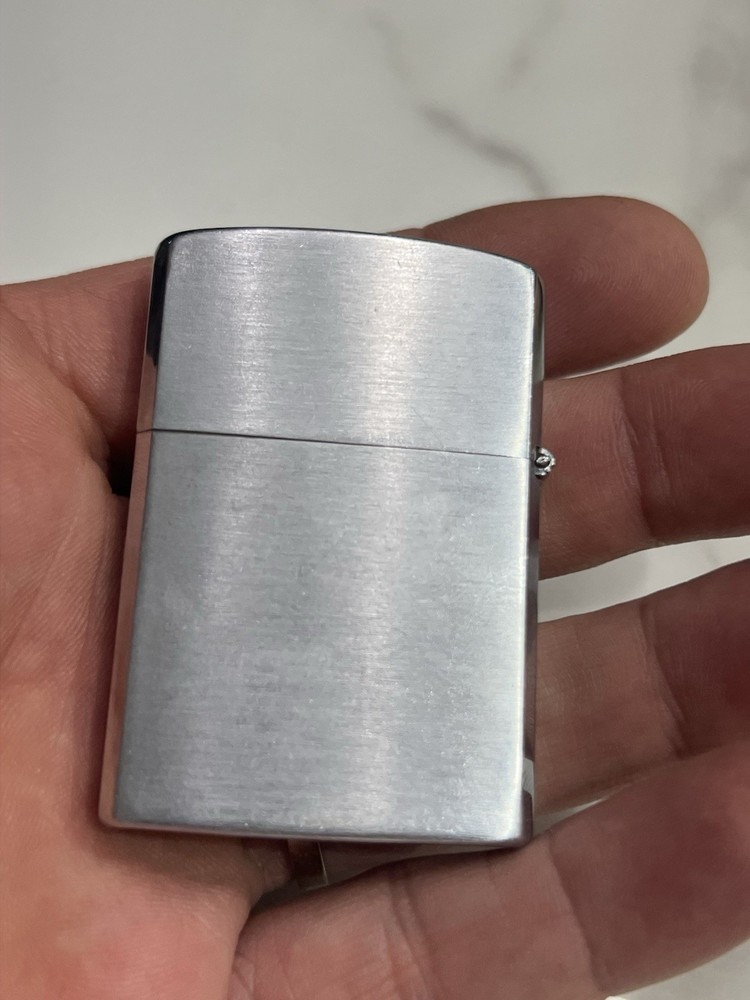 vintage “lowrey” silver matchbox holder