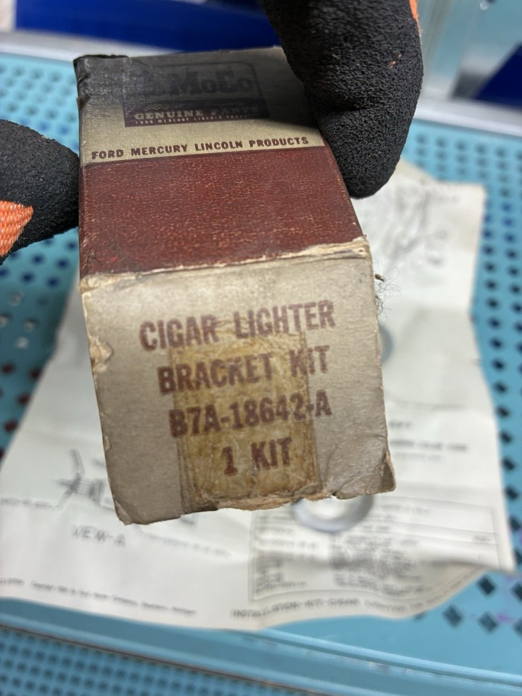 1957-58 FORD UNDER DASH CIGAR LIGHTER BRACKET NOS FORD