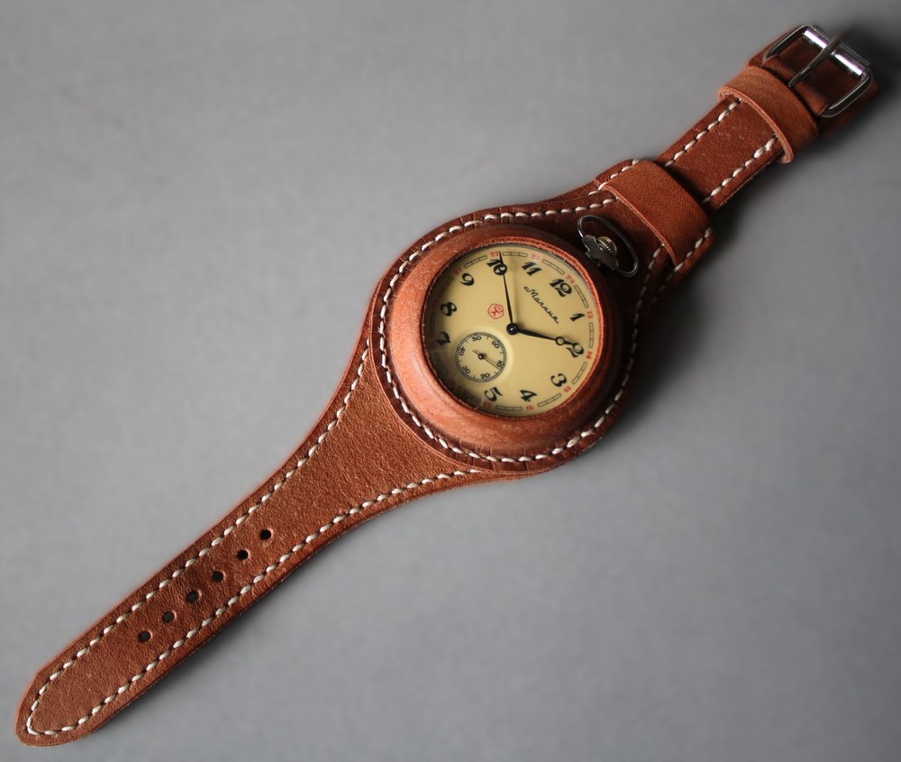 Molniya mechanical watch with a leather strap, wolves