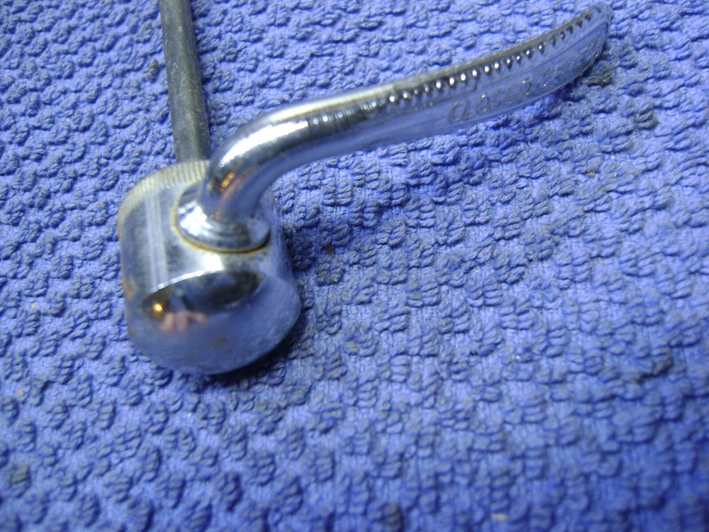 Used Front Ofmega older style road skewer quick release, missing adjuster end