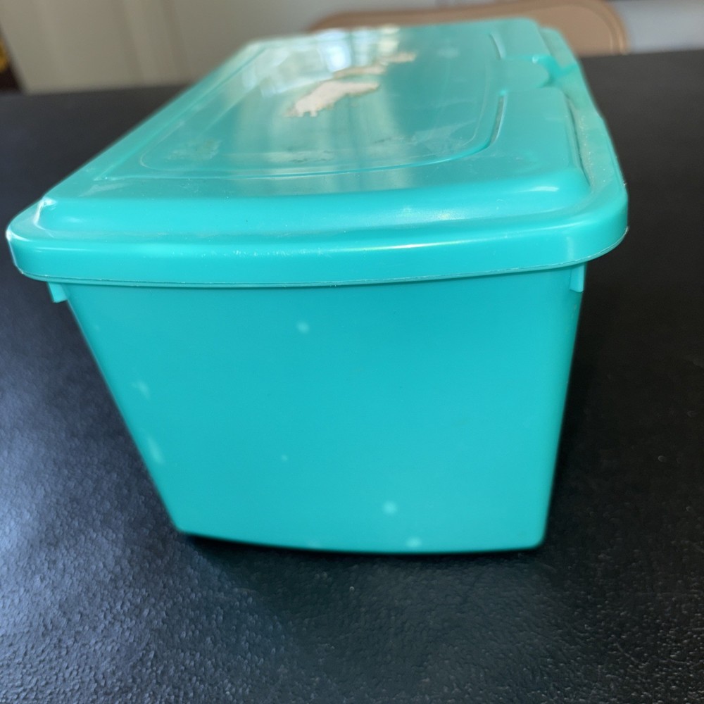Empty Green Pampers Baby Wipes Container