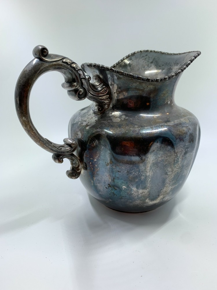 Antique Victor Silver Company melon shape silver plated pitcher ornate handle