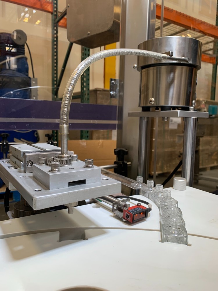 Automated Filling and Capping machine