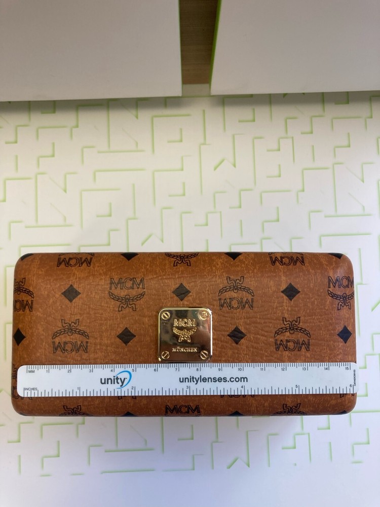 New Large MCM Munchen Hard Shell Case With Original Cloth Sunglass Case.