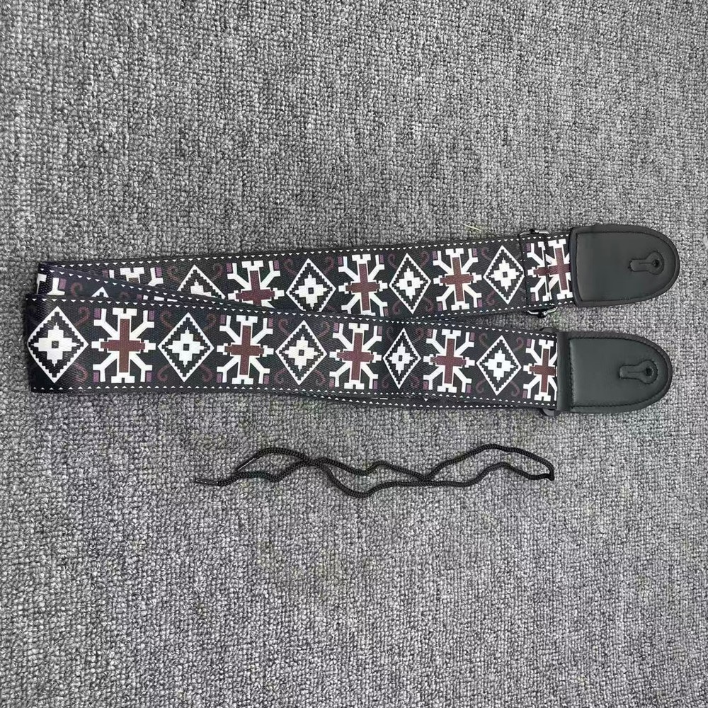 Black checkered pattern guitar strap, highly functional, currently on sale