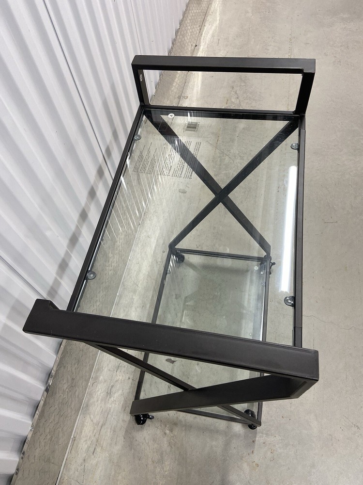 Metal bar cart on wheels
