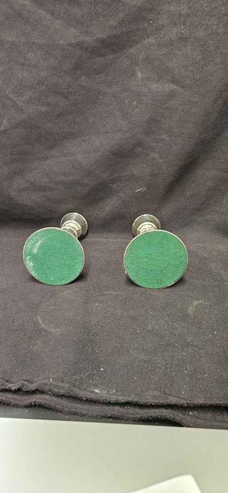A Pair Of Antique Silver Candlesticks