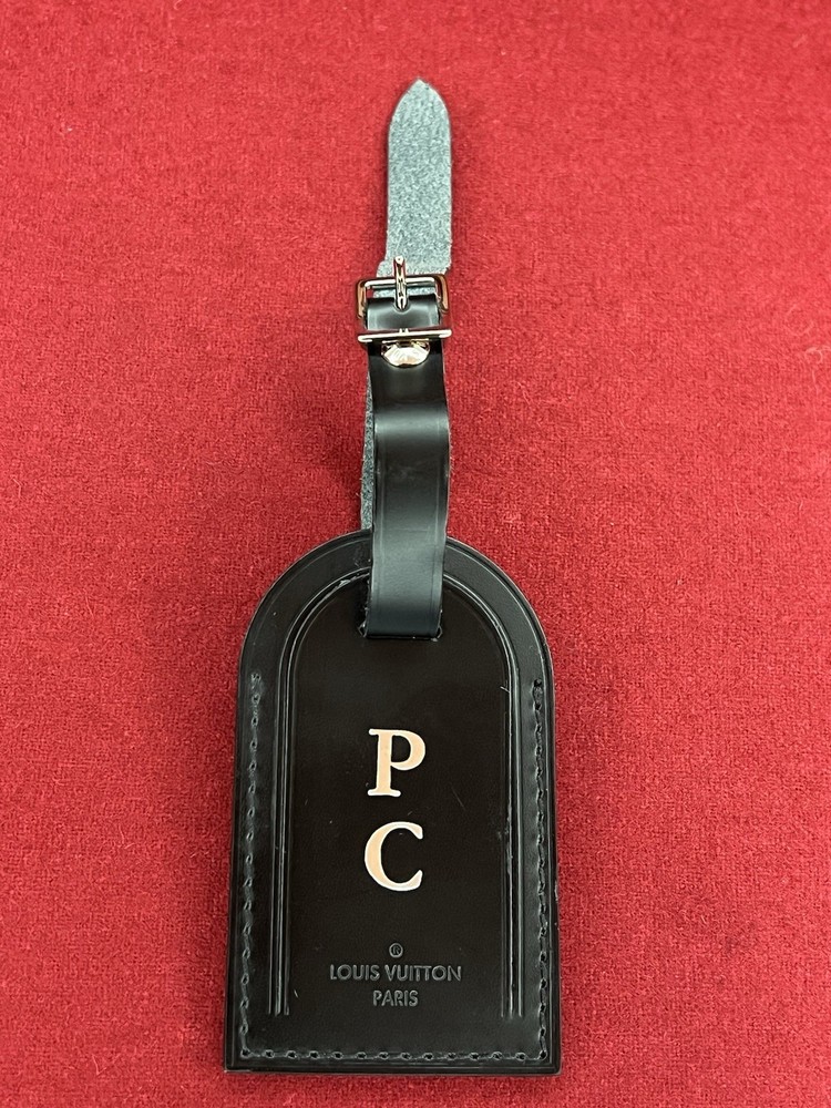 AUTHENTIC Louis Vuitton Black monogrammed leather luggage tag