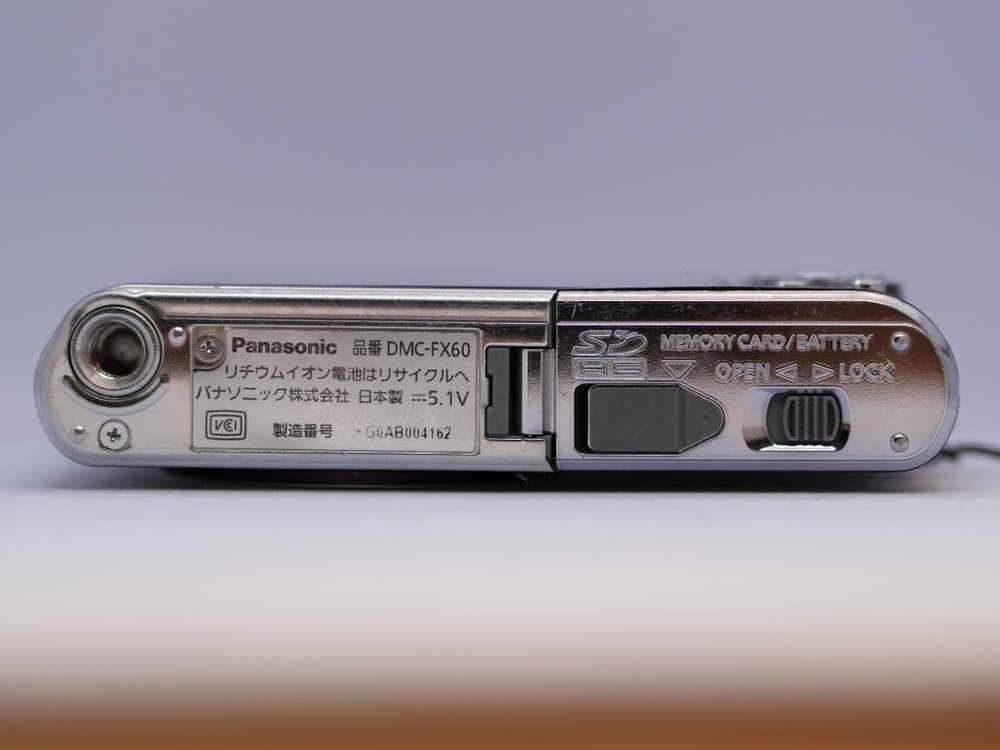 Panasonic Lumix DMC-FX60 Compact Digital Camera with Charger and Strap