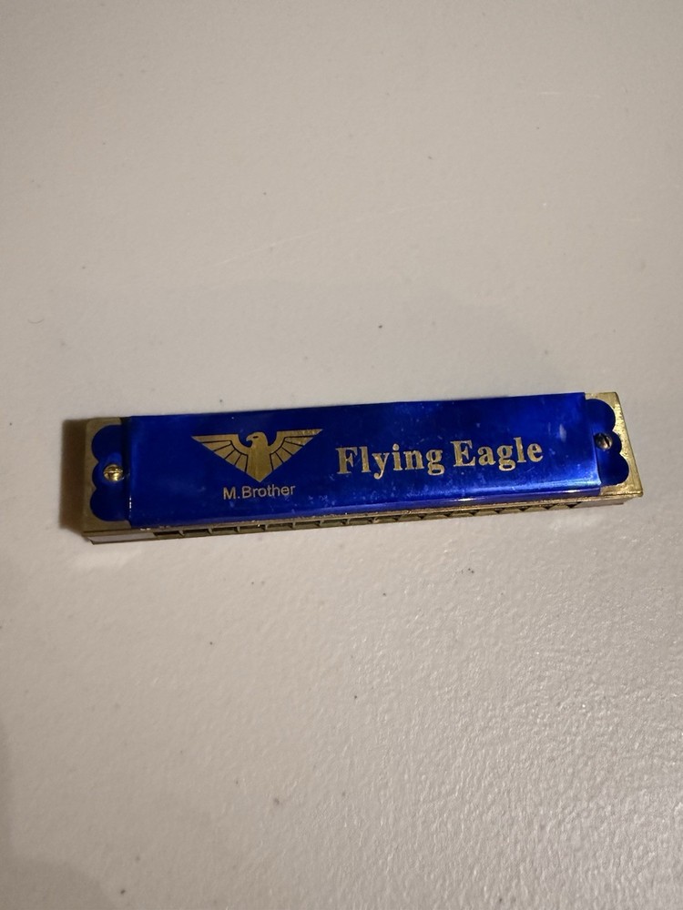 VINTAGE M BROTHER FLYING EAGLE HARMONICA INSTRUMENT, BLUE POLISHED