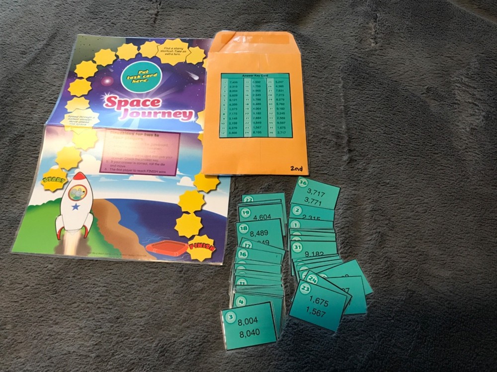 space Journey! Comparing numbers to 10,000 math file folder game grade 3