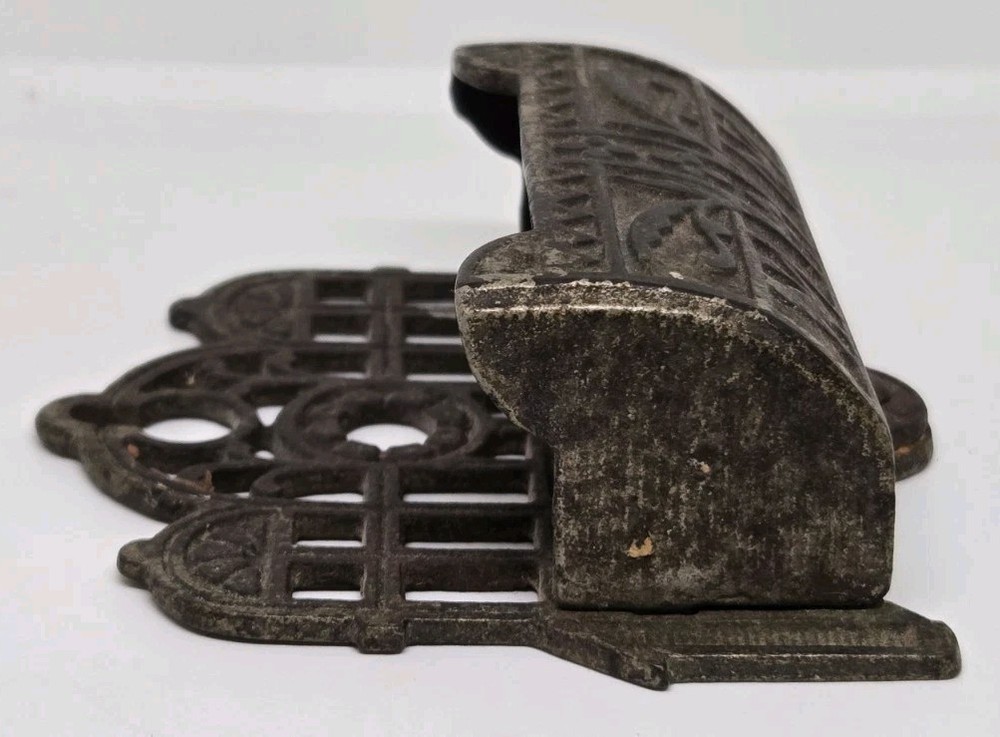 VINTAGE CAST IRON MATCH STRIKER