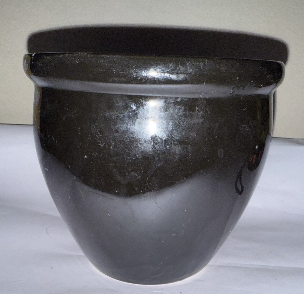 black flower pot pottery vintage