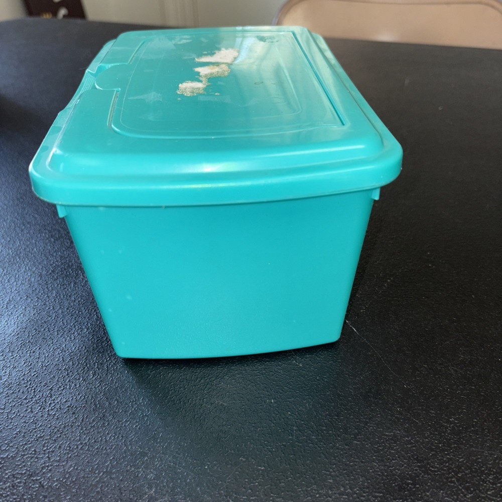 Empty Green Pampers Baby Wipes Container