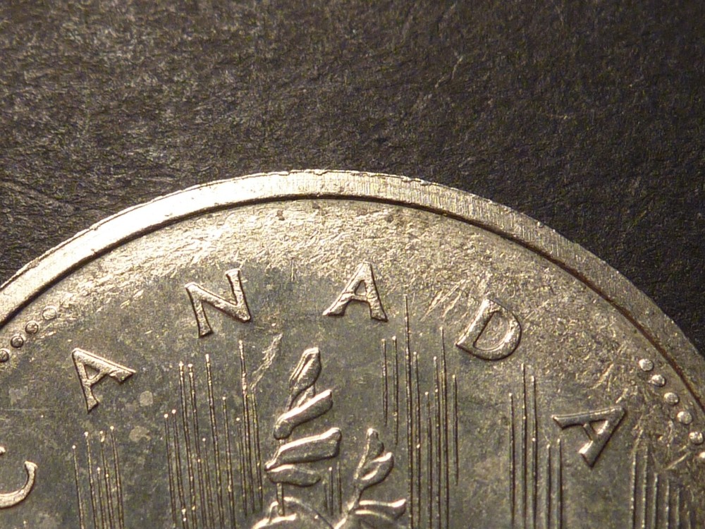 Error: Canada 1977 Det. Jwl. FWL BU $1 with strike-through errors both sides