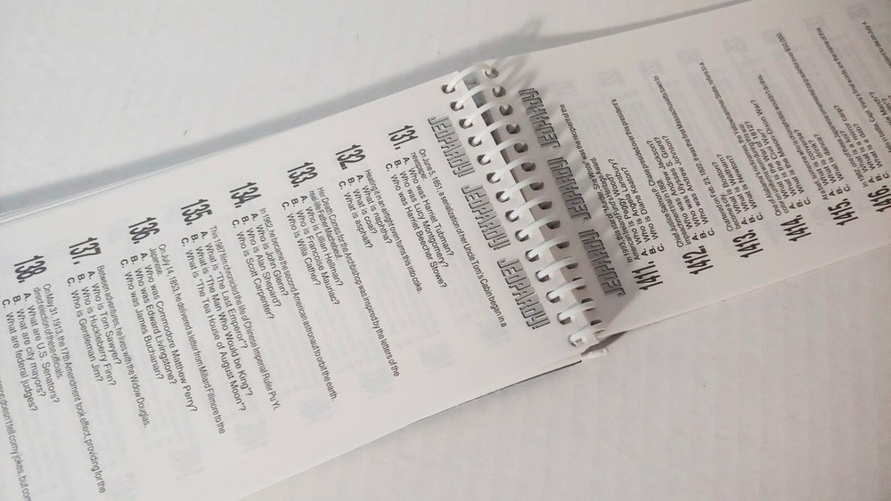 Jeopardy Handheld Electronic Game Complete with Answer/Question Book & Cartridge