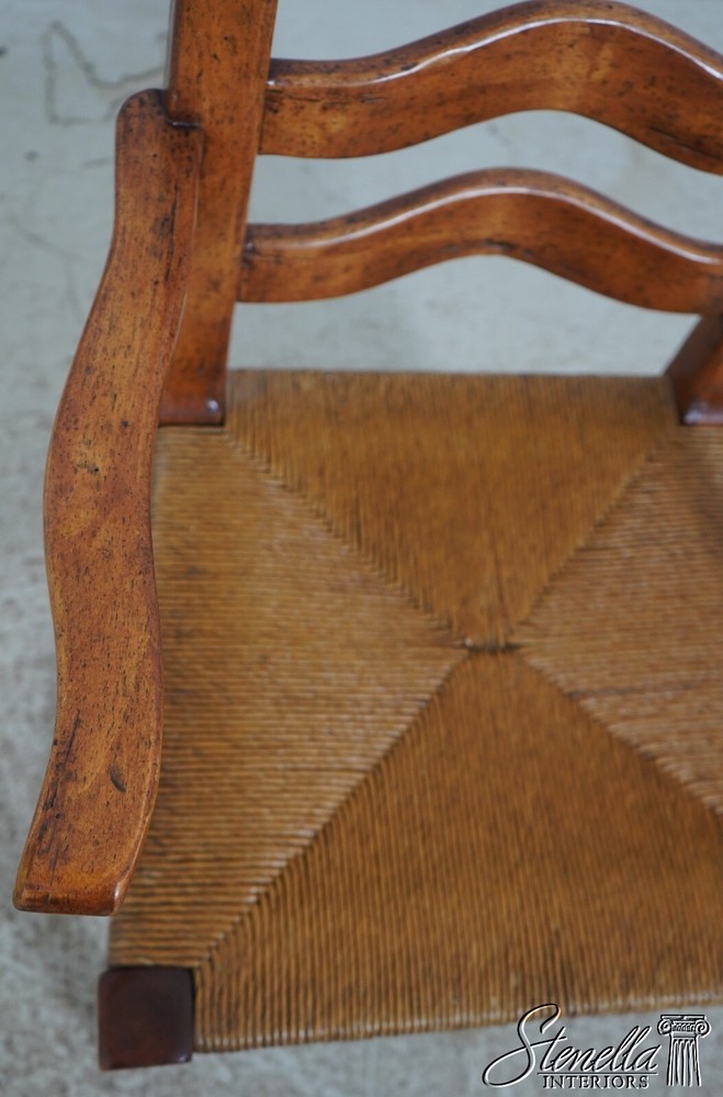 68471: Pair GUY CHADDOCK Distressed Ladderback Armchairs