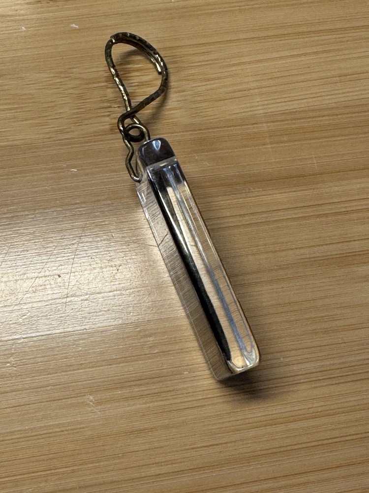 Intel 386 and 486 processor CPUs - both encased in one acrylic keychain