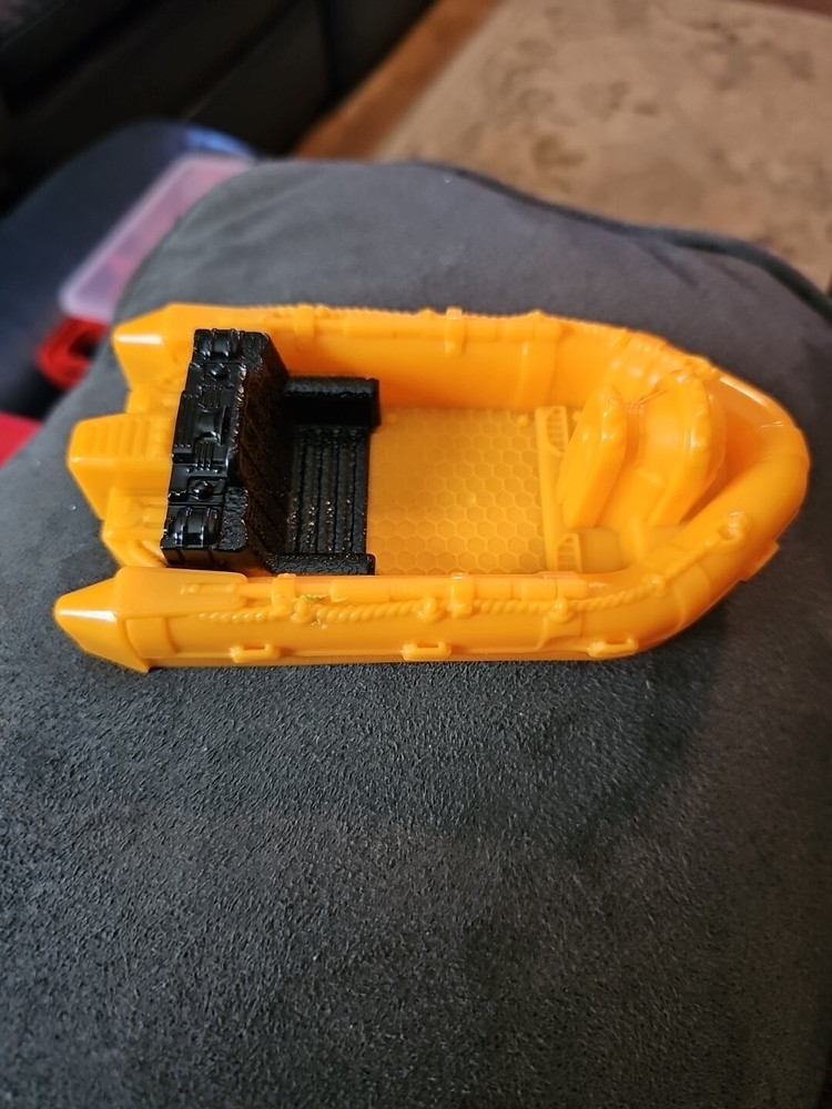 Black And Orange Plastic Boat