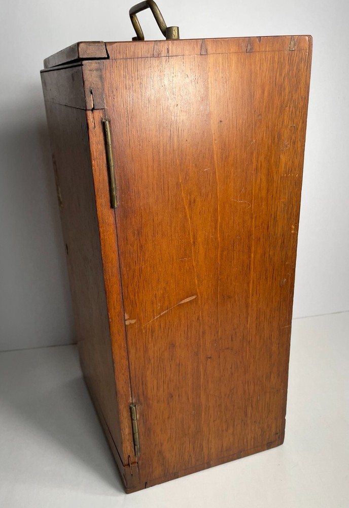 Antique Signed J.H. Steward microscope with case and some accessories.