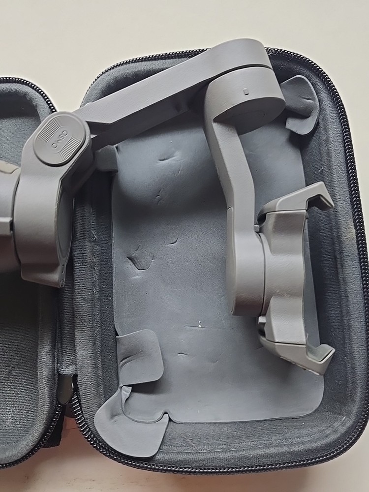 DJI Osmo Handheld 4k Camera and 3-Axis Gimbal